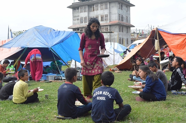 After earthquakes in Nepal destroyed their school, Bloom Nepal students were moved to tents during the monsoon season.