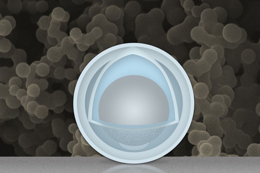 A new "yolk-and-shell" nanoparticle could boost the capacity and power of lithium-ion batteries. The gray sphere at center represents an aluminum nanoparticle, forming the "yolk." The outer light-blue layer represents a solid shell of titanium dioxide, and the space in between the yolk and shell allows the yolk to expand and contract without damaging the shell. In the background is an actual scann...