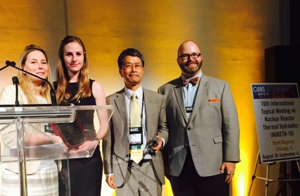 MIT graduate student Carolyn Coyle (second from left) at NURETH-16 in Chicago