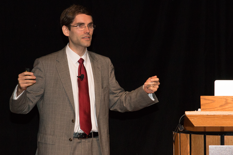 Tomás Palacios, associate professor of electrical engineering and computer science, addresses the annual Materials Day Symposium, "Quantum Materials," at MIT on Oct. 14.