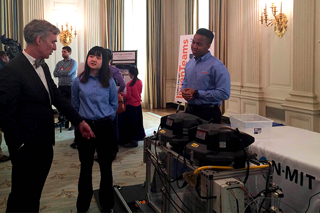 Wendy Ni and Stephen Mwingira speak about their invention with science communications expert Bill Nye at the 2016 White House Science Fair.