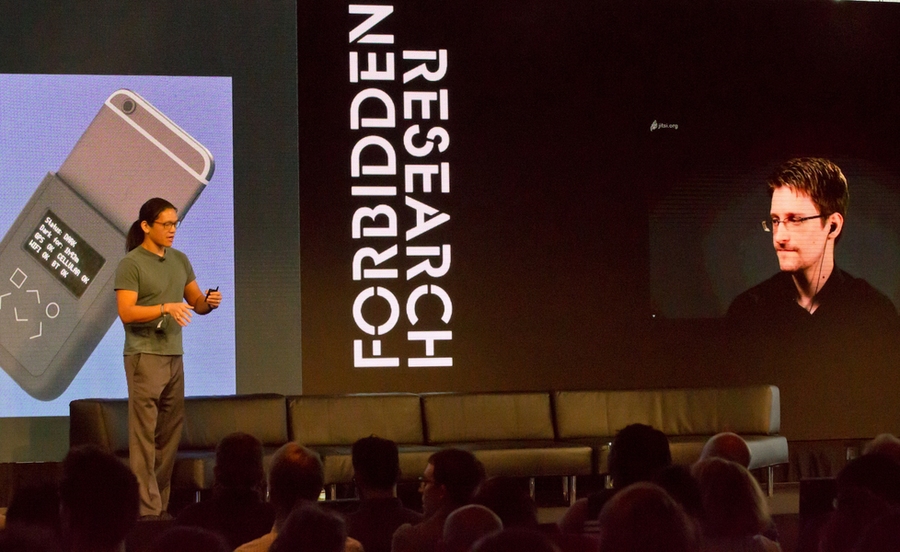 The MIT Media Lab held a symposium on July 21 to explore the “fuzzy line” between disobedience that helps society and disobedience that doesn't. Andrew “bunnie” Huang (left) and Edward Snowden presented their technology to turn journalists’ smartphones into “cyber fortresses.”