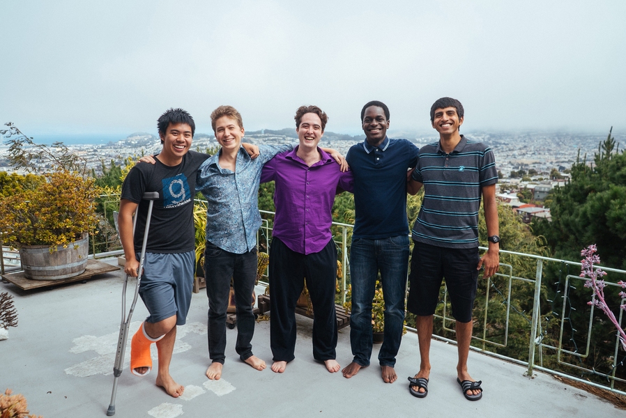 On their balcony at the “Sandcastle” in San Francisco: (left to right) senior Kevin Kwok, senior Guillermo Webster, junior Laser Nite, senior Mohamed “Hassan” Kane, and senior Anish Athalye.