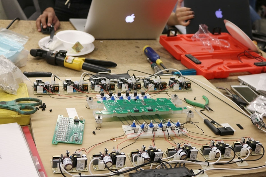 Prototyping the battery pack, many of the parts were cut on the Area 51's water jet cutter.