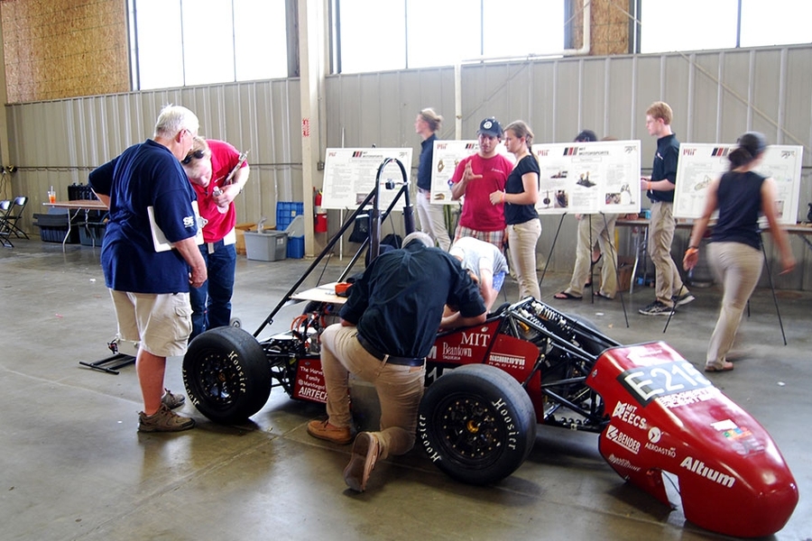 At the 2016 Collegiate Design Series at the Lincoln Airpark in Lincoln, Nebraska, a rigorous inspection of the team's vehicle takes place.