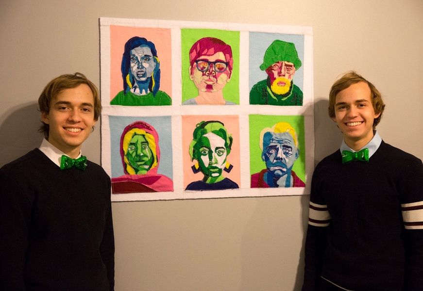 Allan and Danny Gelman pose in front of their piece entitled "Stitched Together."
