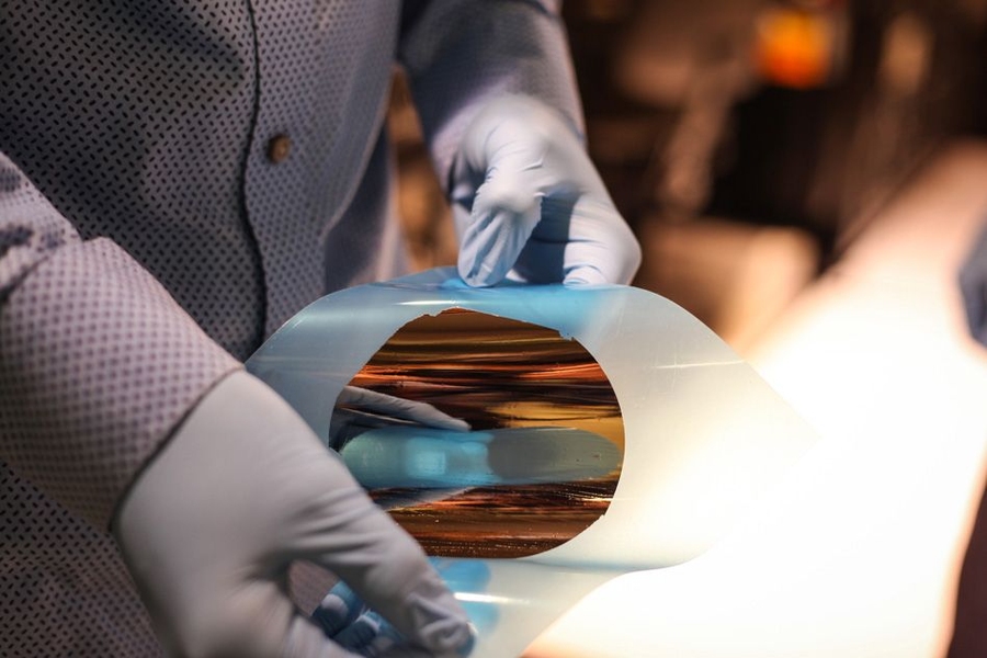 A nickel film peel-off from a silicon wafer demonstrates the concept of using a 2-D-material-based transfer process for wafers.