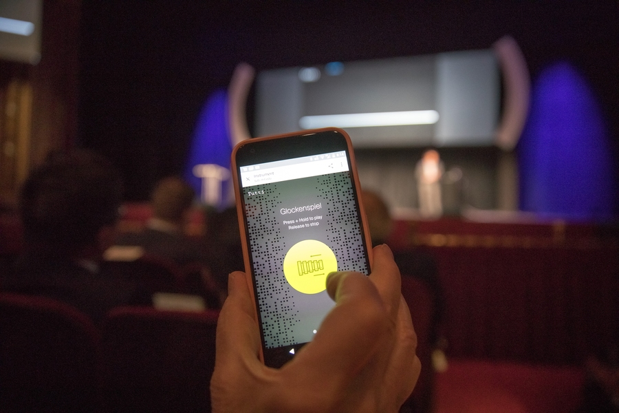 Using a new music application called “Tutti” (Italian for “together”) and audience members' cell phones, professor of the practice Eran Egozy transformed the audience into an orchestra for a rendition of “Engineered Engineers,” a composition created for the event by Evan Ziporyn, the Kenan Sahin Distinguished Professor and Music and Theater Arts chair.