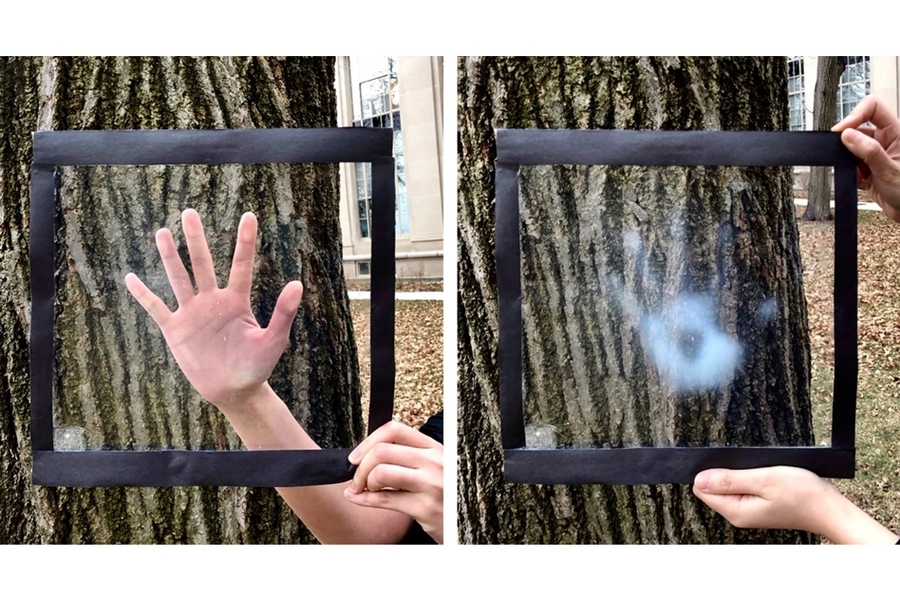 The coating turns frosty when exposed to temperatures of 89 degrees Fahrenheit or higher, such as when a researcher touches the window with her hand.