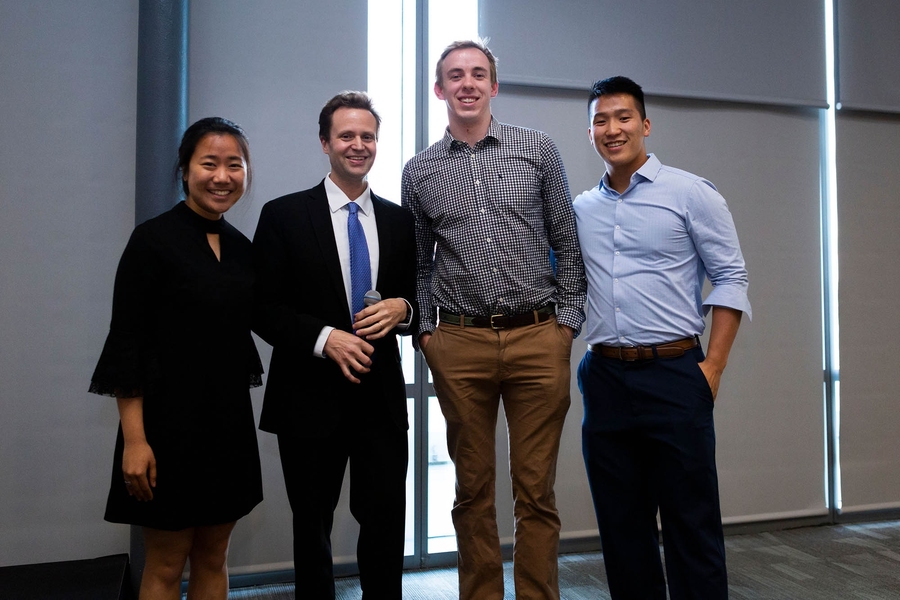 Left to right: Senior Apisada "Ju" Chulakadabba, CEE department head and McAfee Professor Markus Buehler, senior Tim Roberts, and senior David Wu received awards for the top capstone poster presentations.