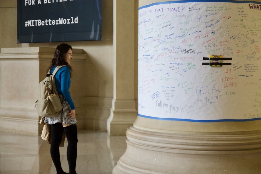 As part of an MIT "Tomorrow Time" event, Lobby 7 pillars were wrapped with poster paper asking the community what they have been procrastinating on.