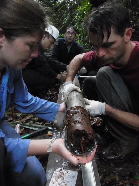 Until now, measuring the progression of this draining and drying process has required arduous treks through dense forests and wet land, and help from local people who know their way through the remote trackless swampland. Here, researchers study a core sample from the deep layer of peat.