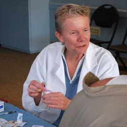 Nurse practitioner Jackie Sherry, MIT Medical’s infection control coordinator, prepares to vaccinate a patient at a flu clinic last year.
