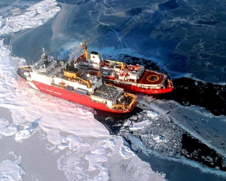 The U.S. Coast Guard icebreaker Healy and the Canadian Coast Guard icebreaker Louis S. St-Laurent during joint exercises to define the full extent of the Arctic continental shelf.