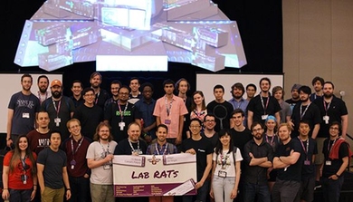 Thirty-eight Lab RATs, weary after 52 hours of hacking their competitors' computer networks, posed for a team photograph at the DEF CON Capture the Flag competition held at Caesar's Palace in Las Vegas.