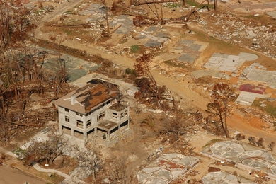 An aerial photograph of a home built to FEMA standards in the aftermath of Hurricane Katrina