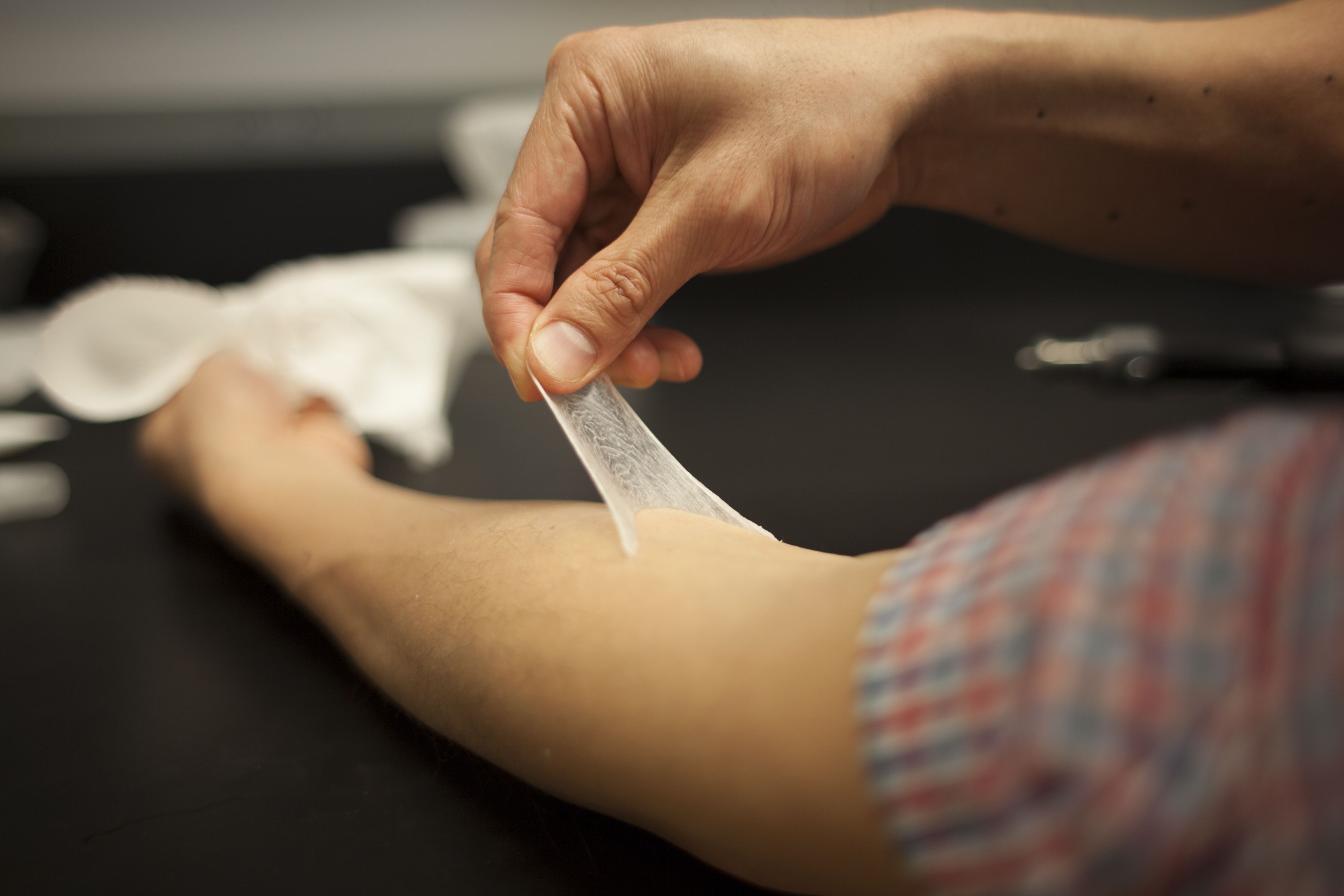 New material temporarily tightens skin, MIT News