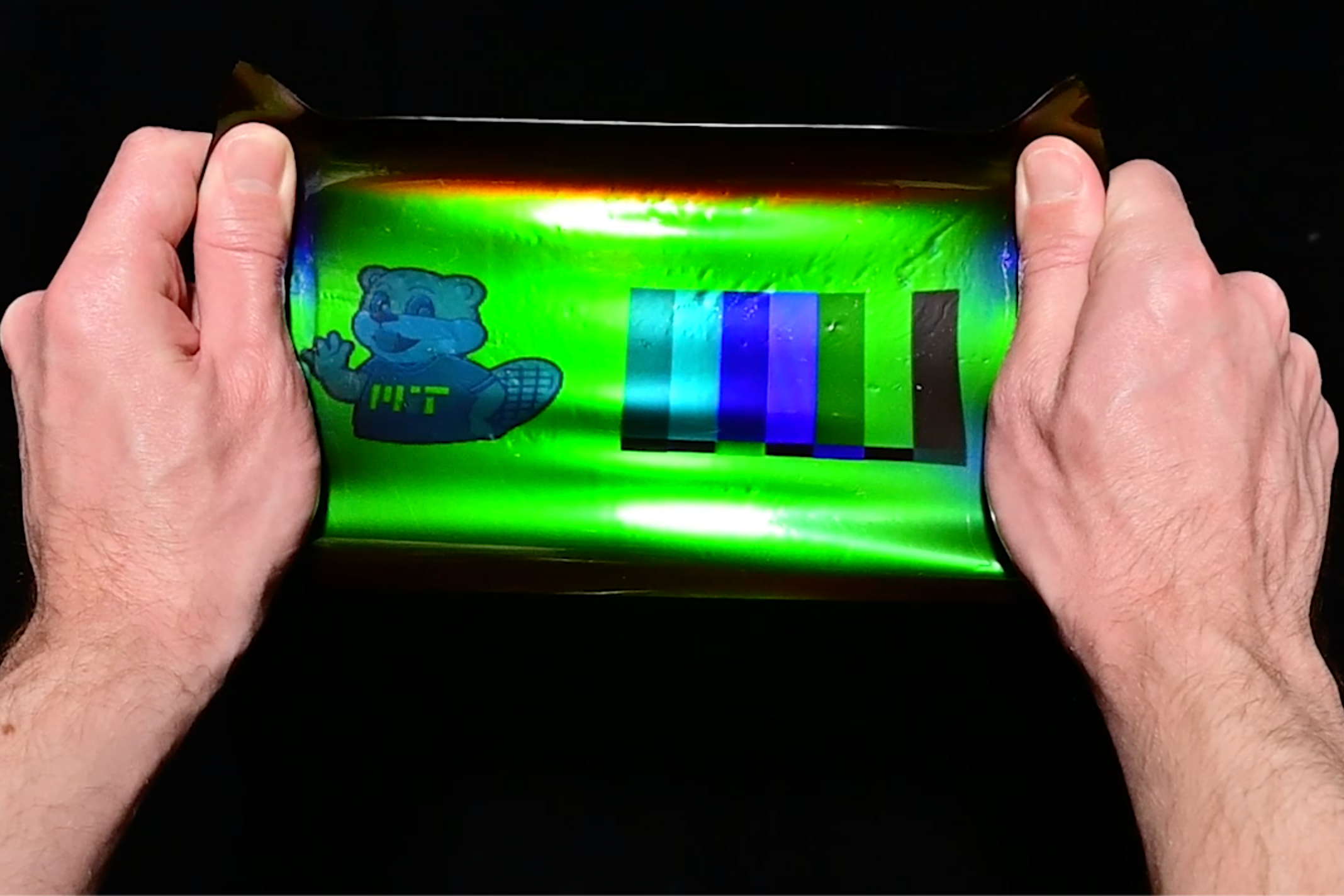 Engineers repurpose 19th-century photography technique to make stretchy,  color-changing films, MIT News
