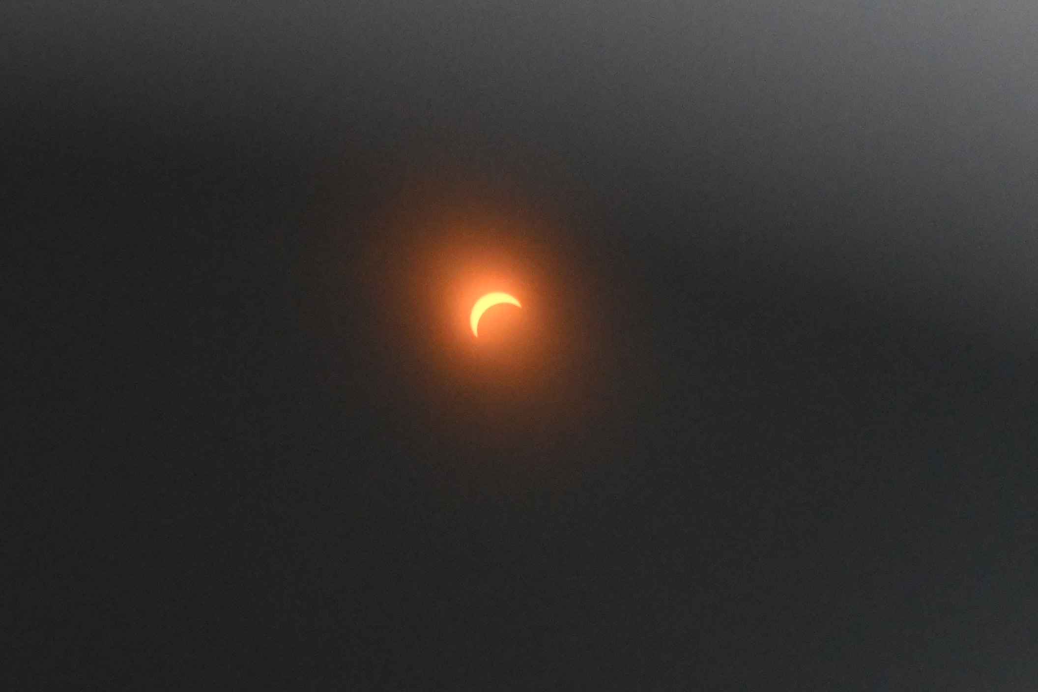 A view of the eclipse through eclipse glasses