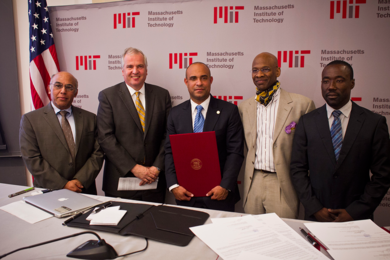 From left to right: Director of MIT's Office of Educational Innovation and Technology Vijay Kumar, MIT Provost Chris Kaiser, Haiti Prime Minister Laurent Lamothe, MIT Linguistics Professor Michel DeGraff and Haiti Minister of National Education and Vocational Training Vanneur Pierre at the signing of a joint commitment to an initiative for digital learning in Kreyòl.