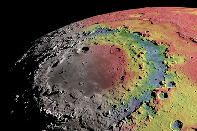 This image shows free-air gravitational anomalies and a shaded topographic relief of the Moon’s 930-km-diameter Orientale impact basin. Red corresponds to mass excesses and blue to mass deficits relative to a reference value. This gravitational field model, based on measurements acquired from the NASA GRAIL mission, shows the detailed structure of the central basin depression that is filled with...