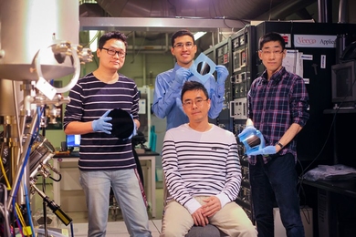 (Left to right): Postdoc Kyusang Lee, Professor Jeehwan Kim (sitting), and graduate students Samuel Cruz and Yunjo Kim.