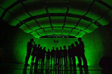 Chorallaries of MIT a cappella group on stage at the Kresge Auditorium