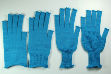 Researchers at MIT demonstrated gloves fabricated by a system for automating knitted garments.