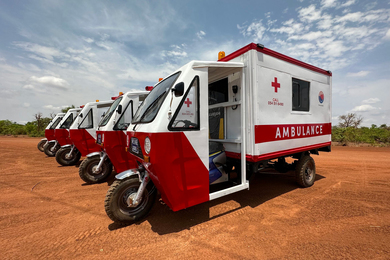 A line of motorized tricycle ambulances