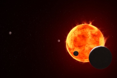 An artist’s rendition of the night side of exoplanet TRAPPIST-1e as it transits in front of its host star. Three other planets are also depicted.