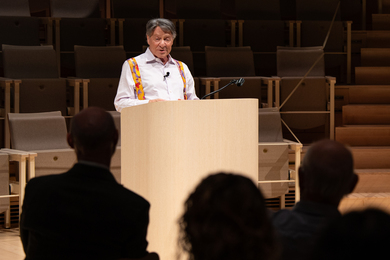 Ray Kurzweil at the podium.