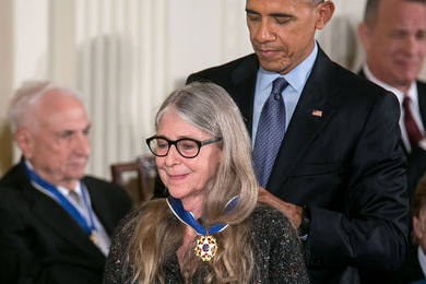 Barack Obama pins a Presidential Medal of Freedom on Margaret Hamilton