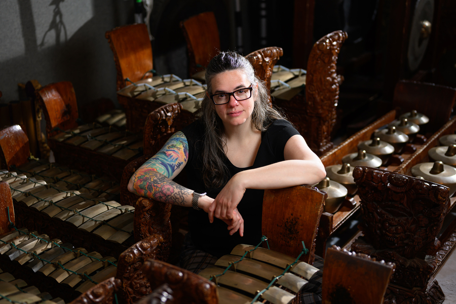 Leslie Tilley surrounded by musical instruments