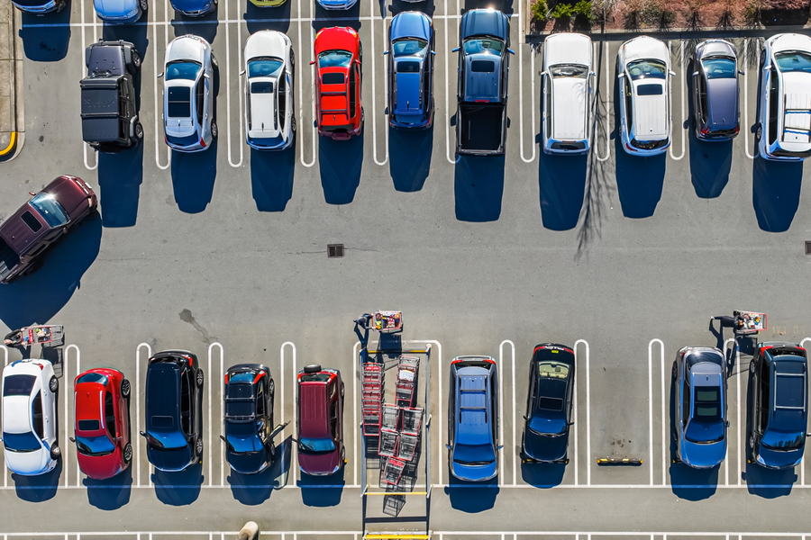 Aerial view of a parking lot with few open spaces