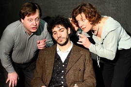 A sleeping Einstein (Robert Najarian) listens to the whispers of  dreamtellers (Debra Wise & Steven Barkhimer) in the production of "Einstein's Dreams," produced by the  Catalyst Collaborative at MIT.