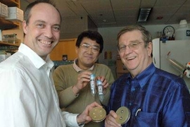Philip Lessard, Kazuhiko Kurosawa and Anthony Sinskey display a new type of antibiotic they produced by pitting two strains of bacteria against one another. Lessard, a research scientist, and postdoc Kurosawa work in the MIT lab of Sinskey, a professor of microbiology and health sciences and technology.