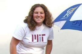 Tish Scolnik poses with a folding three-wheeled wheechair prototype.