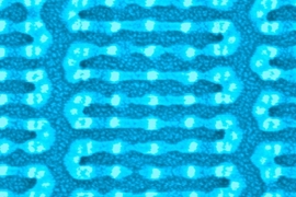 MIT researchers coaxed tiny, chainlike molecules to arrange themselves into complex patterns, like this one, on a silicon chip. Previously, self-assembling molecules have required some kind of template on the chip surface — either a trench etched into the chip, or a pattern created through chemical modification. But the MIT technique instead uses sparse silicon “hitching posts.” The molecule...