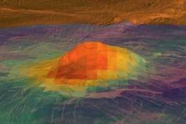 Based on topographic data obtained by NASA’s Magellan spacecraft, this figure shows the volcanic peak Idunn Mons in the Imdr Regio area of Venus. The colored overlay shows the heat patterns derived from surface brightness data collected by VIRTIS aboard the European Space Agency’s Venus Express spacecraft. The brightness signals the composition of the minerals that have been changed due to lav...