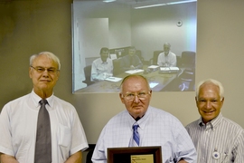 Paul Thomas (front, center), flanked by PSFC Director Miklos Porkolab (left) and MIT Vice President for Research and Associate Provost Claude Canizares (right), received an Appreciation Award via videoconference from the Department of Energy’s Associate Director for Fusion Energy Sciences, Ed Synakowski (back, right), accompanied by Acting Division Director of Research Steve Eckstrand (back, cen...