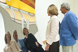 From left to right: MIT President Susan Hockfield; Associate Provost Philip Khoury; and Jane Farver, director of the MIT List Visual Arts Center, gaze at their reflections in Anish Kapoor's stainless-steel sculpture housed in MIT's Stata Center.