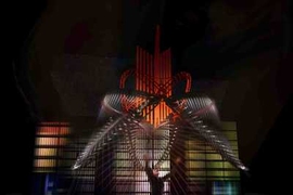 <em>Death and the Powers</em> introduces new performance techniques and an animated set, including a musical chandelier with dozens of Teflon strings that can be played by the performers.