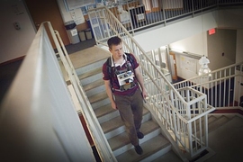 Maurice Fallon, a research scientist in MIT’s Computer Science and Artificial Intelligence Laboratory, demonstrates how a user would wear the sensor.