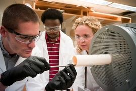 From left: Postdoc Alexis Grimaud, mechanical engineering graduate student David Kwabi and materials science and engineering graduate student Kelsey Stoerzinger work in the laboratory of Associate Professor Yang Shao-Horn, the Electrochemical Energy Lab.