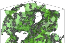 In a 50/50 mix of copper and niobium, regions that are richer in copper separate from regions that are richer in niobium. The interface between these two kinds of regions forms an irregular sponge-like surface, shown in this visualization in green. While most of the material is disordered (making it a glass), small collections of atoms at the boundary zone (shown in gray) form a stiff interconnect...