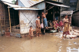 Floodwaters surrounding houses in Dhaka, Bangladesh