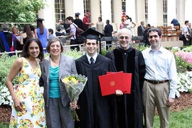 Todd Rosenfield (center) received two master’s degrees at Commencement on June 6, bringing the family’s MIT degree total to 10. With him are (left to right) his wife Runa; mother, Nancy; father, Don; and brother, Adam. Todd’s sister and fellow MIT graduate, Jennifer Rosenfield, was in California and could not attend.