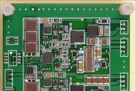 The front (top) and back (bottom) of a prototype 30W LED driver.