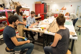 Tomorrow Is Another Day works on their “Best Overall”-winning hack at Hacking Arts 2014.