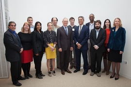 Current and past recipients stand with President L. Rafael Reif and Vanu Bose, son of Amar Bose. (Left to right): Rajeev Ram, Janet Conrad, Jeffrey Grossman, Sangeeta Bhatia, Polina Anikeeva, Nicholas Makris, President Reif, Joel Voldman, Vanu Bose, Jacquin Niles, Joseph Checkelsky, Sara Seager, and Sylvia Ceyer.